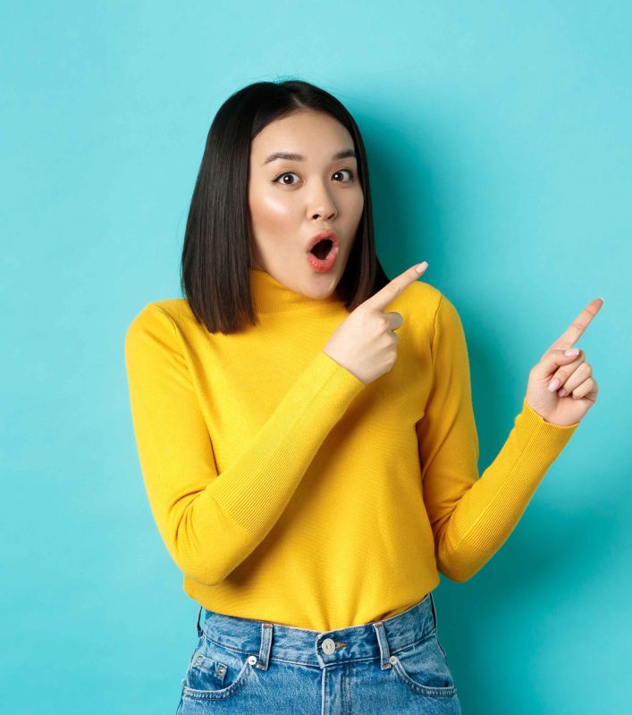 vecteezy_shopping-concept-impressed-korean-girl-say-wow-and-pointing_47959883